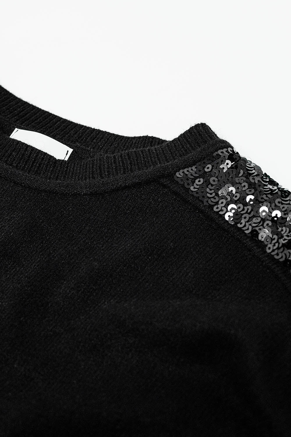 Black long sleeves sweater with sequins on the shoulders Q2 Sweaters BoutiqueLua