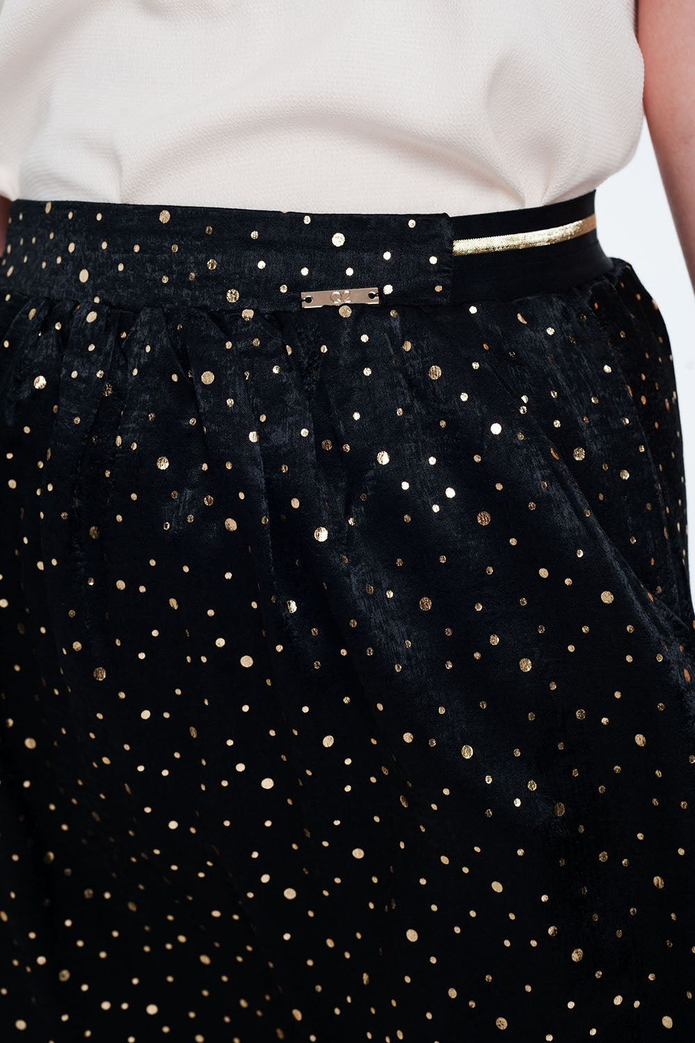 Black mini skirt with pleats in gold polka dot Q2 Skirts BoutiqueLua