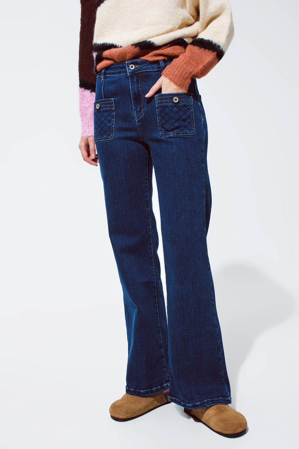 Blue jeans with buttoned pocket details in dark wash Q2 Jeans BoutiqueLua