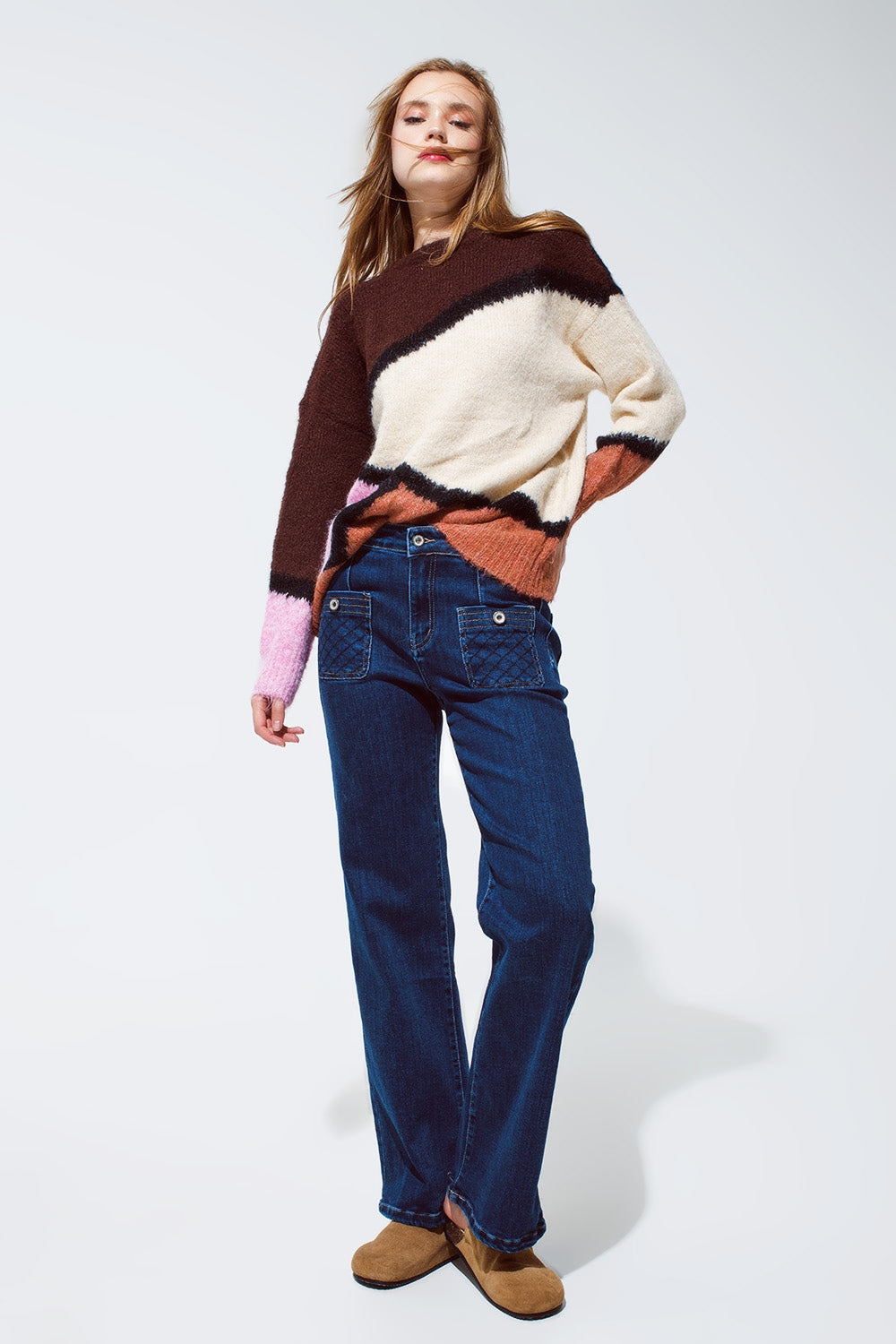 Blue jeans with buttoned pocket details in dark wash Q2 Jeans BoutiqueLua