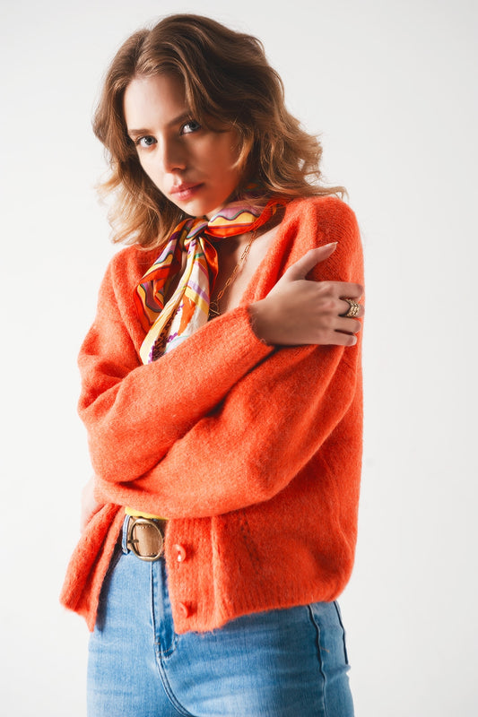 Button down cardigan in orange Q2 Sweaters BoutiqueLua