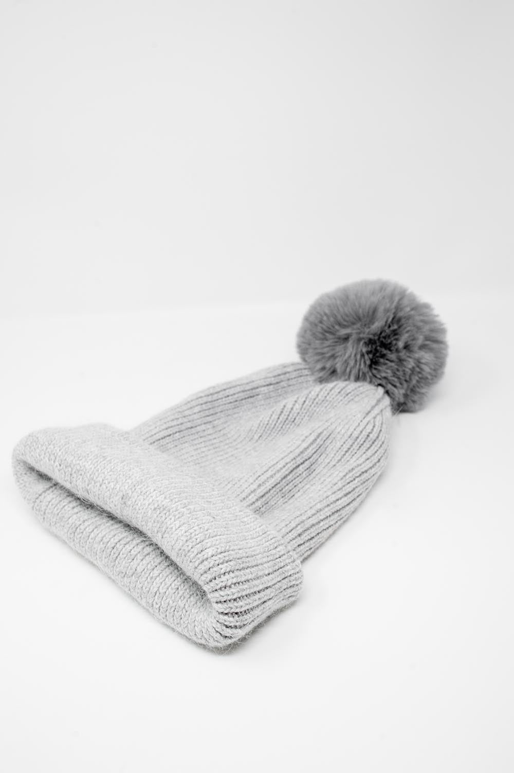 Gray knitted hat with pompom Q2 Hats BoutiqueLua