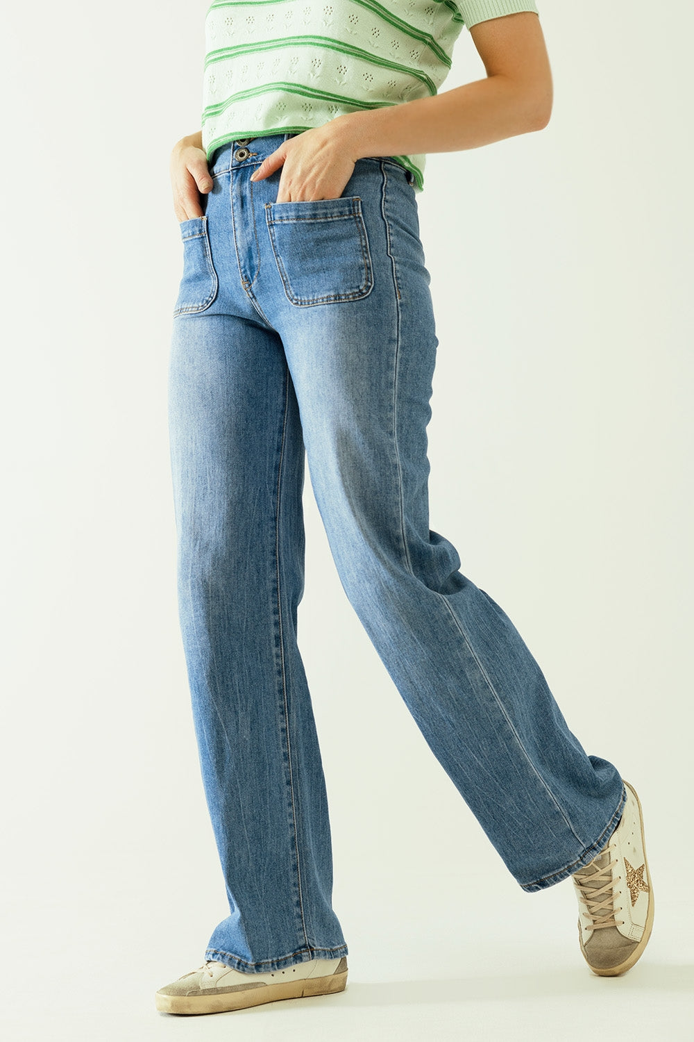 Jeans wide legs with front closure with metalic buttons and front pockets Q2 Jeans BoutiqueLua