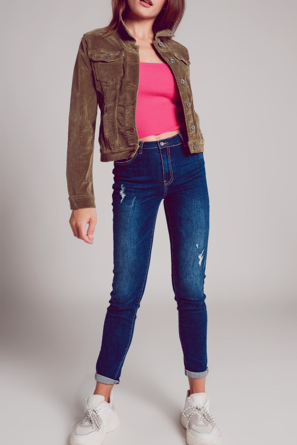 Khaki cropped cord jacket with a young woman wearing it.