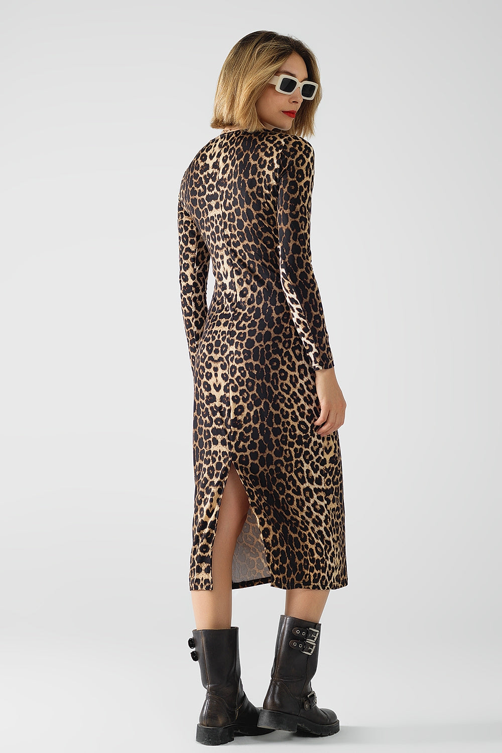 Leopard print Spandex dress with pleat detail at the waist Q2 Dresses BoutiqueLua