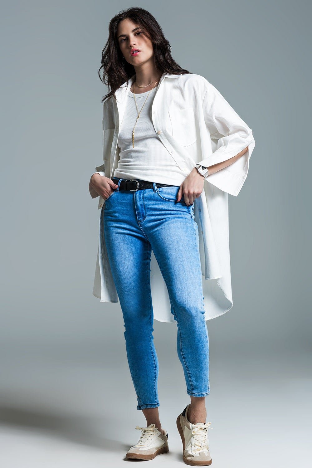 Light blue basic skinny jeans with short slit at hem Q2 Jeans BoutiqueLua