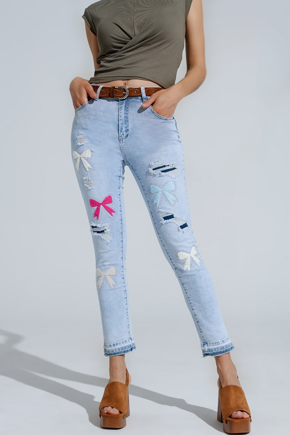 Light Blue super Skinny Jeans With Bow ties and Ripped Holes Q2 Jeans BoutiqueLua