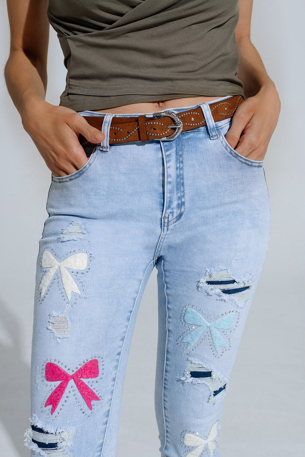 Light Blue super Skinny Jeans With Bow ties and Ripped Holes Q2 Jeans BoutiqueLua