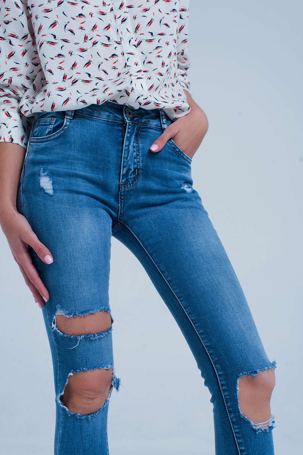 Light ripped skinny jeans in blue Q2 Jeans BoutiqueLua