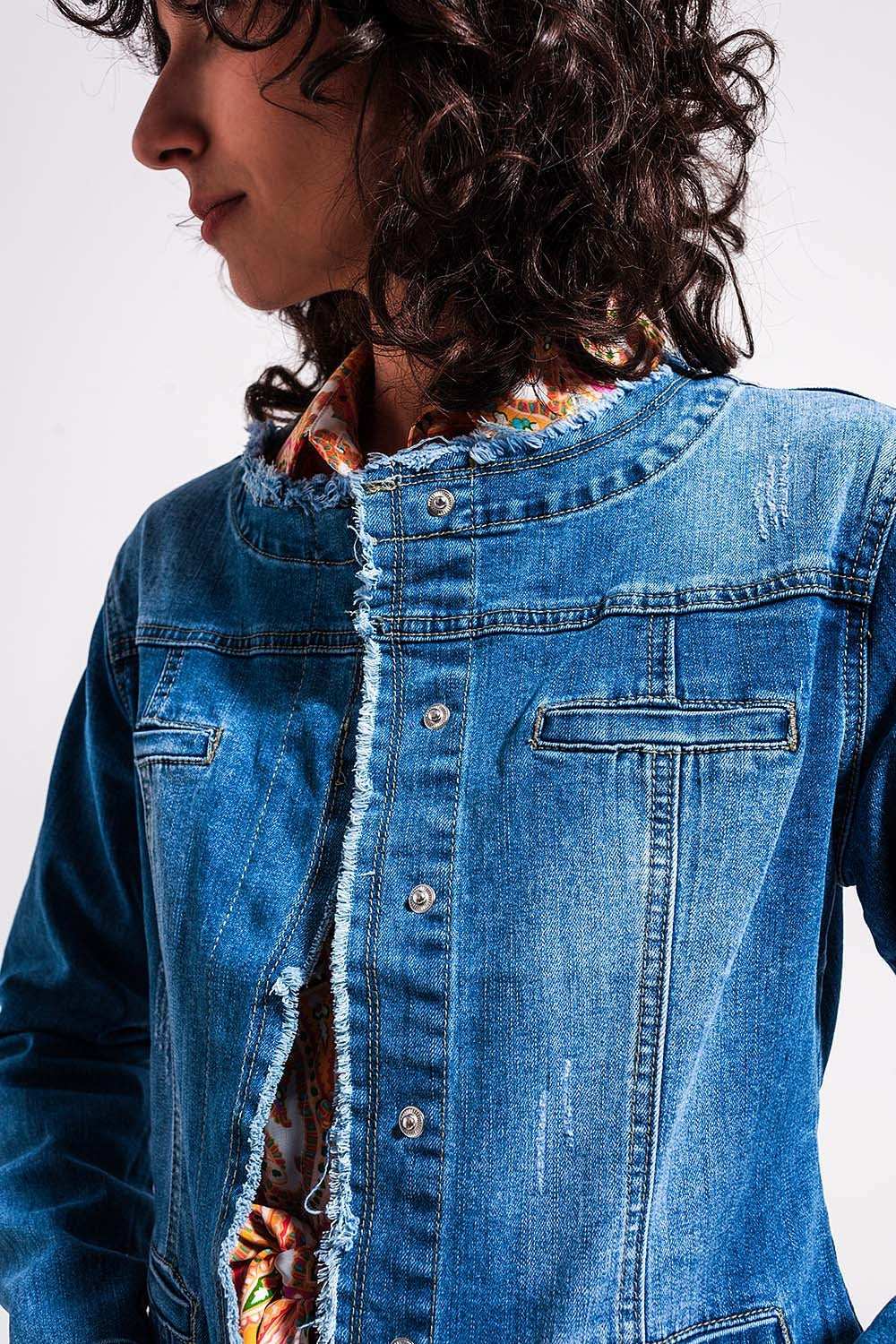 Light wash denim jacket with raw hem edge