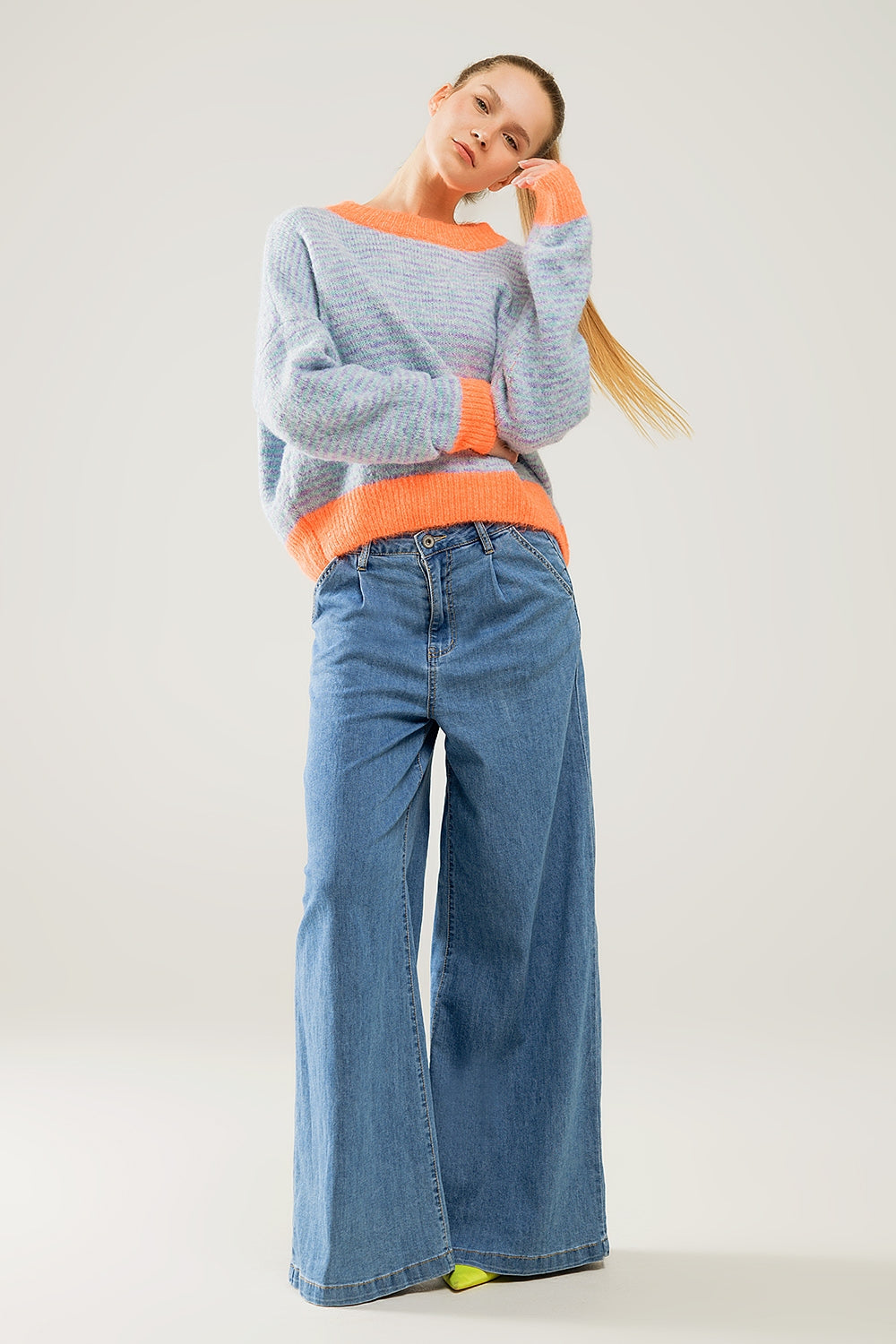 light wash extra wide leg jeans with pleats