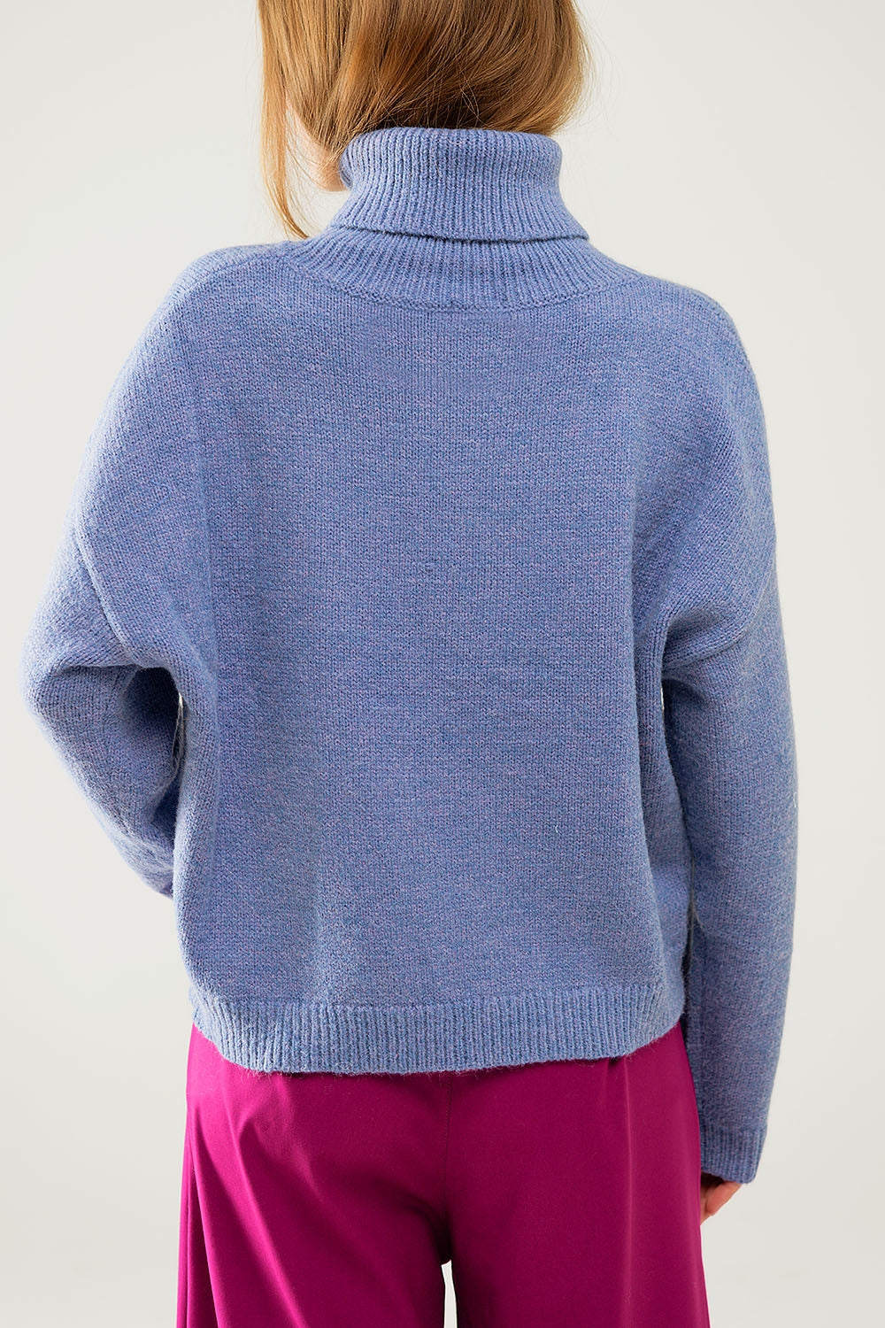 Loose blue sweater with dropped sleeves