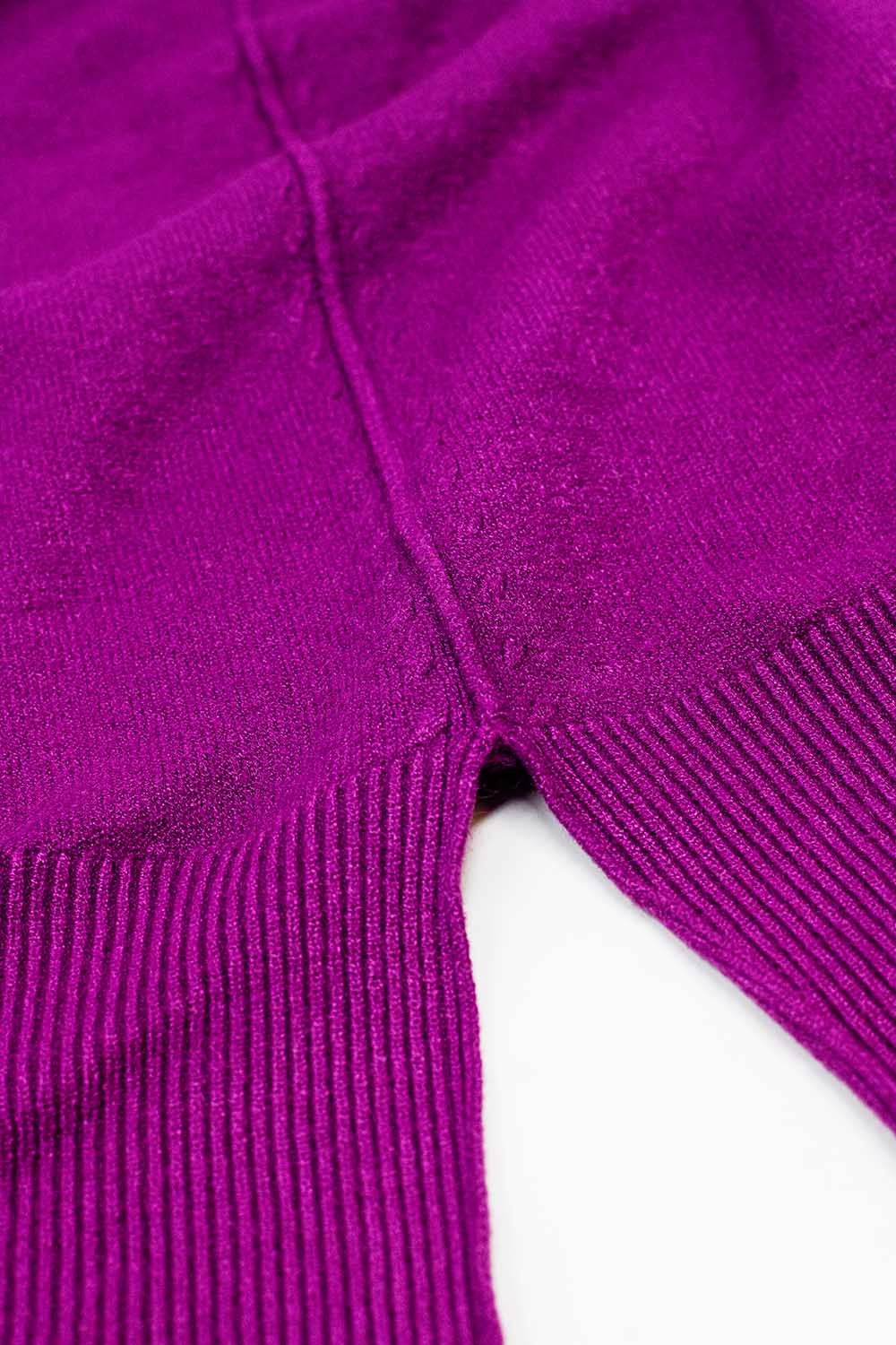 Loose fuchsia sweater with open back detail