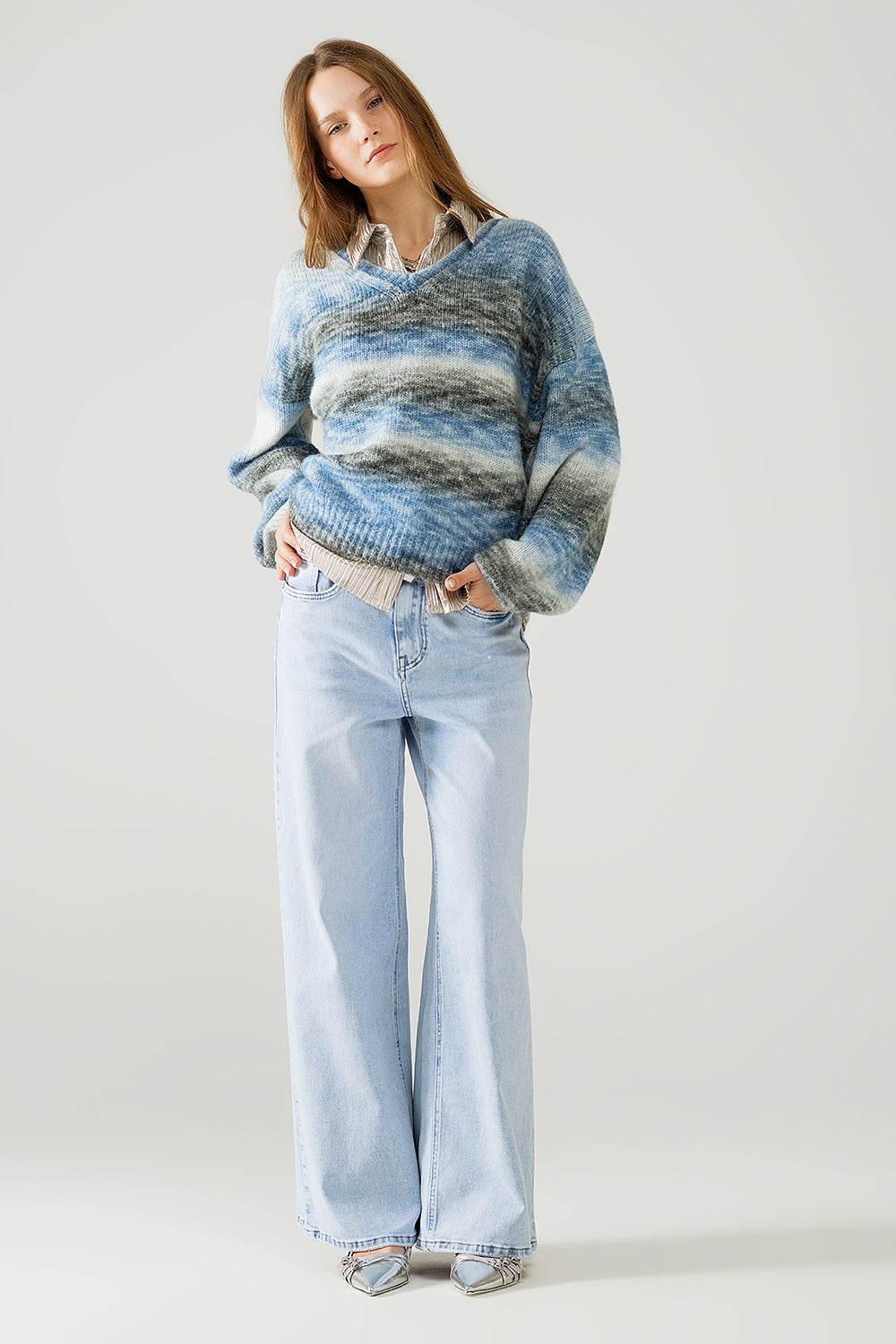 Loose V-neck sweater with blue and grey stripes