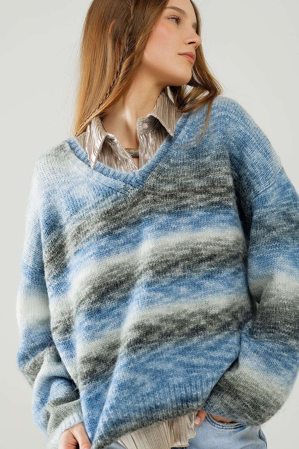 Loose V-neck sweater with blue and grey stripes