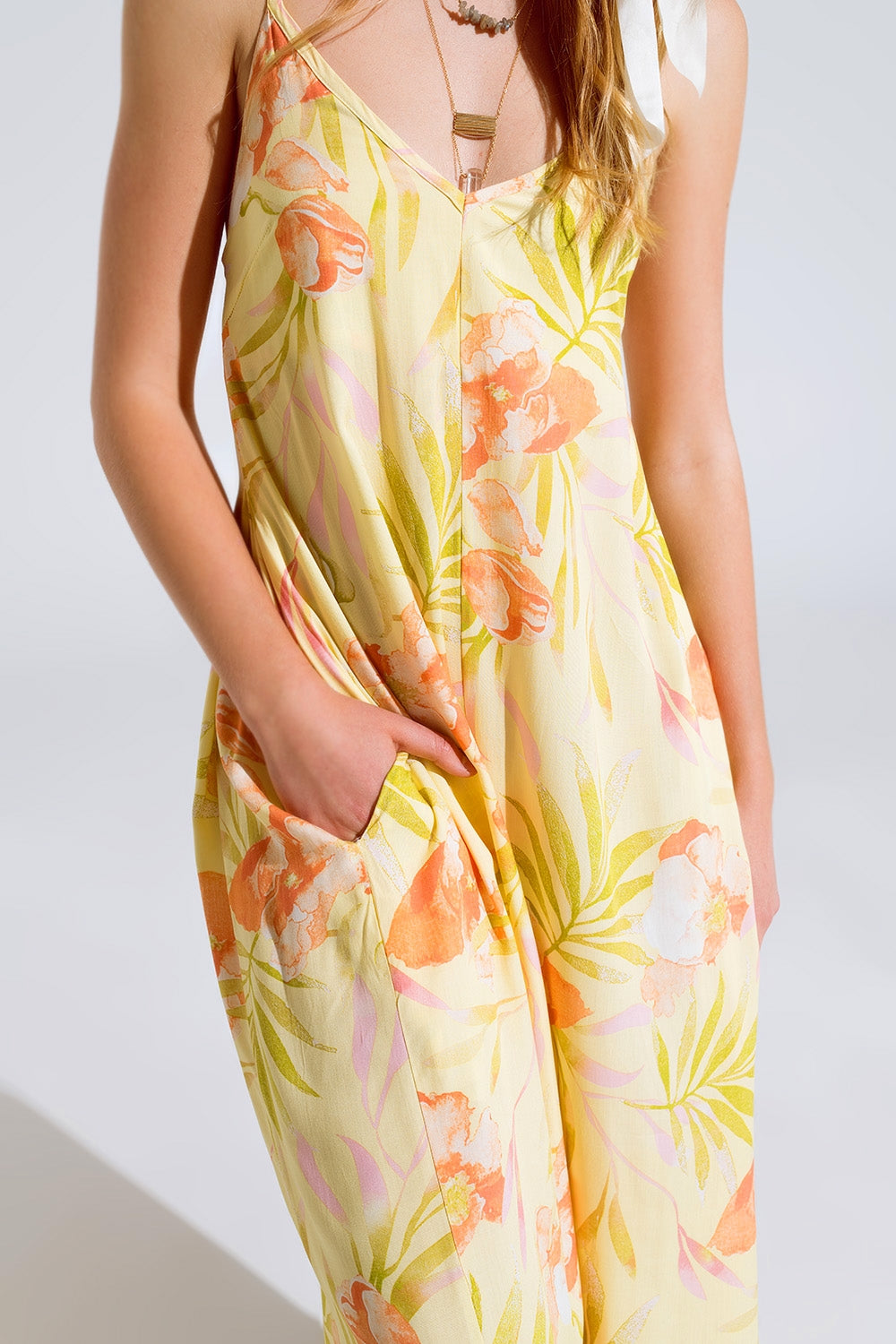 maxi yellow jumpsuit in tropical print Q2 Dresses BoutiqueLua