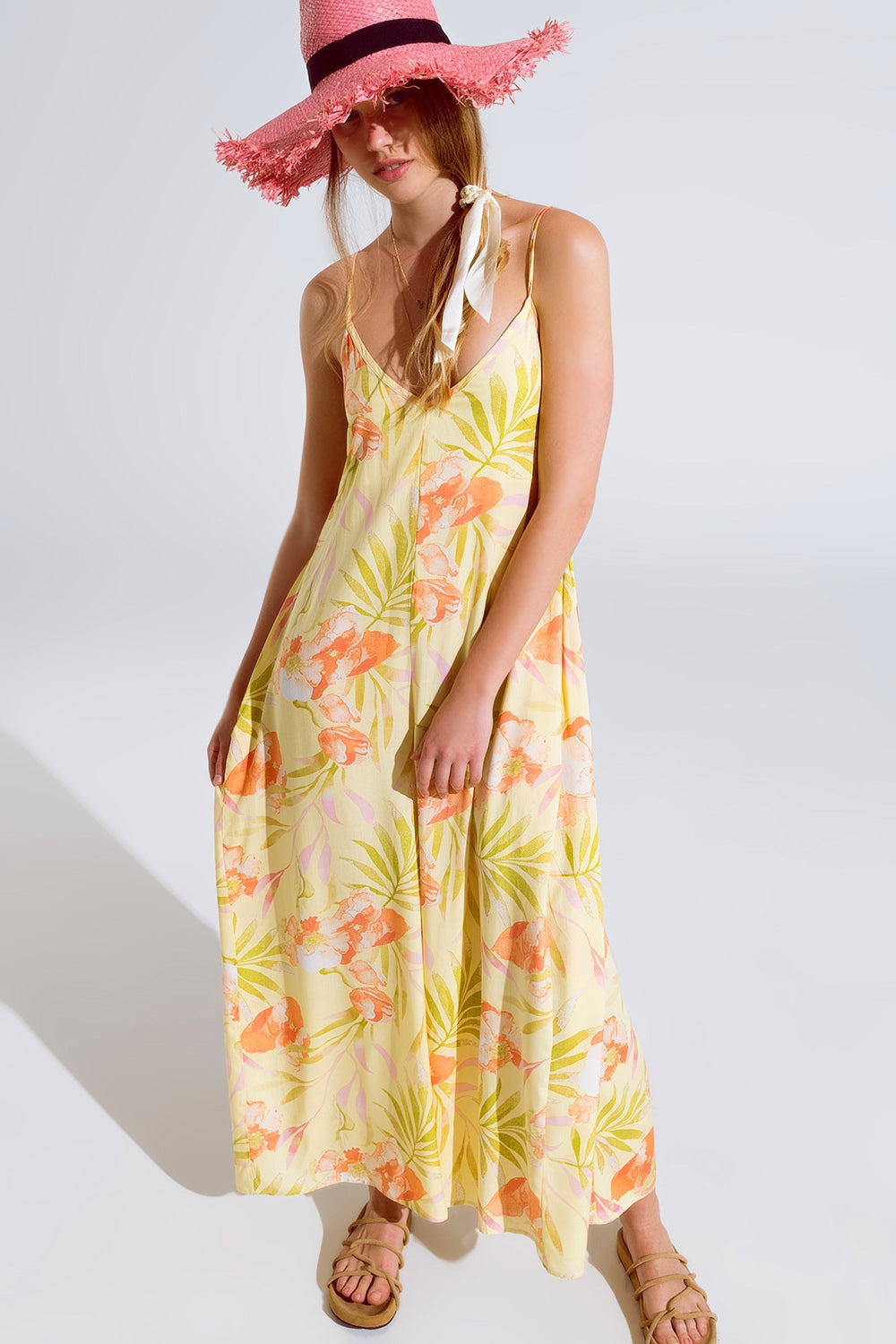 maxi yellow jumpsuit in tropical print Q2 Dresses BoutiqueLua