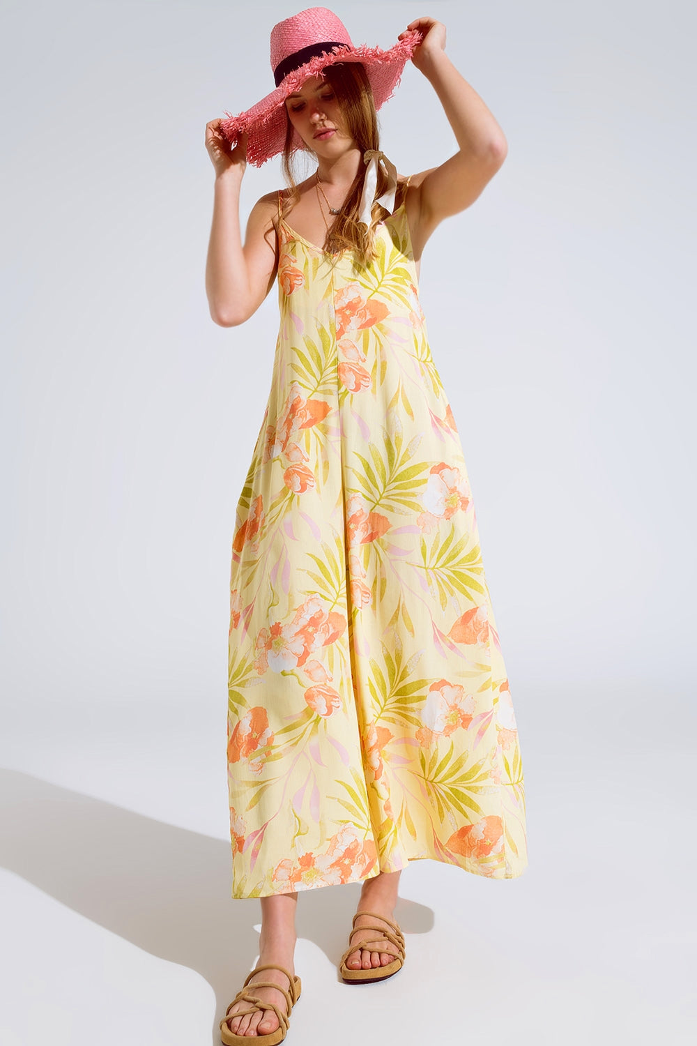 maxi yellow jumpsuit in tropical print Q2 Dresses BoutiqueLua