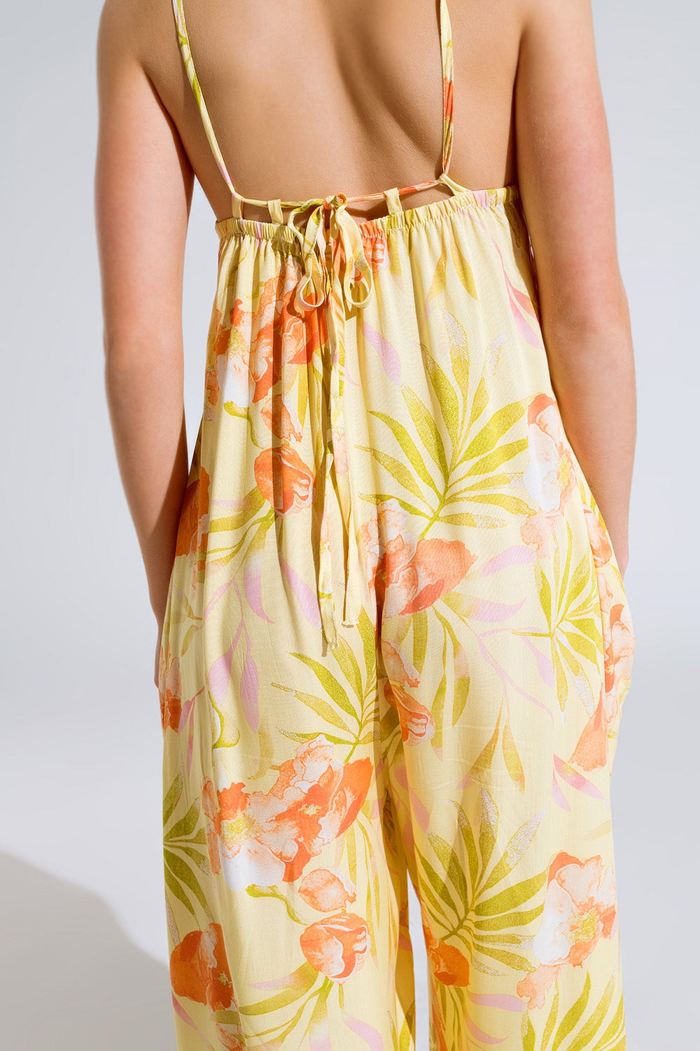 maxi yellow jumpsuit in tropical print Q2 Dresses BoutiqueLua