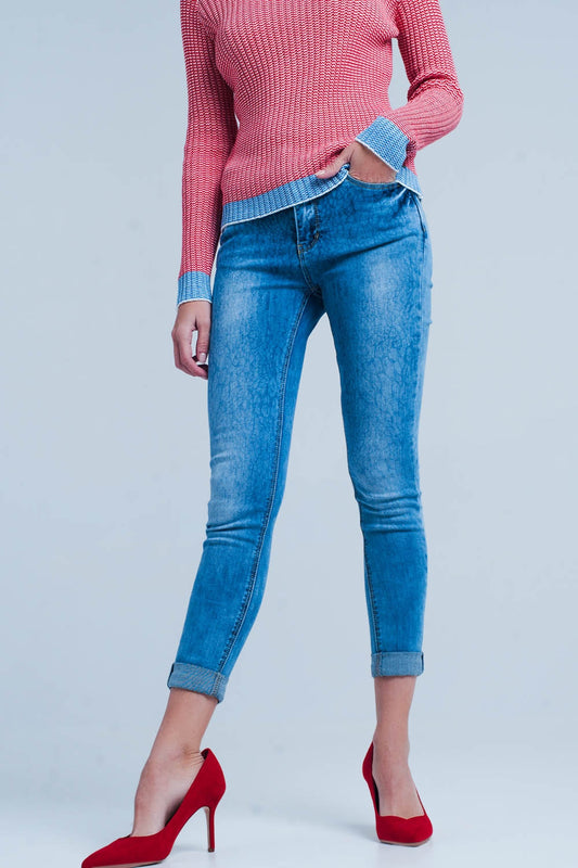 Q2 Medium wash skinny jeans with leopard print