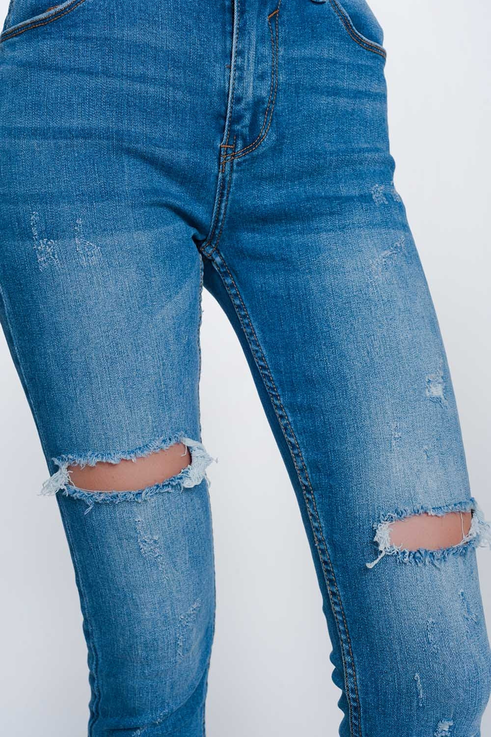 Mid denim super skinny jeans with holes in the knees Q2 Jeans BoutiqueLua