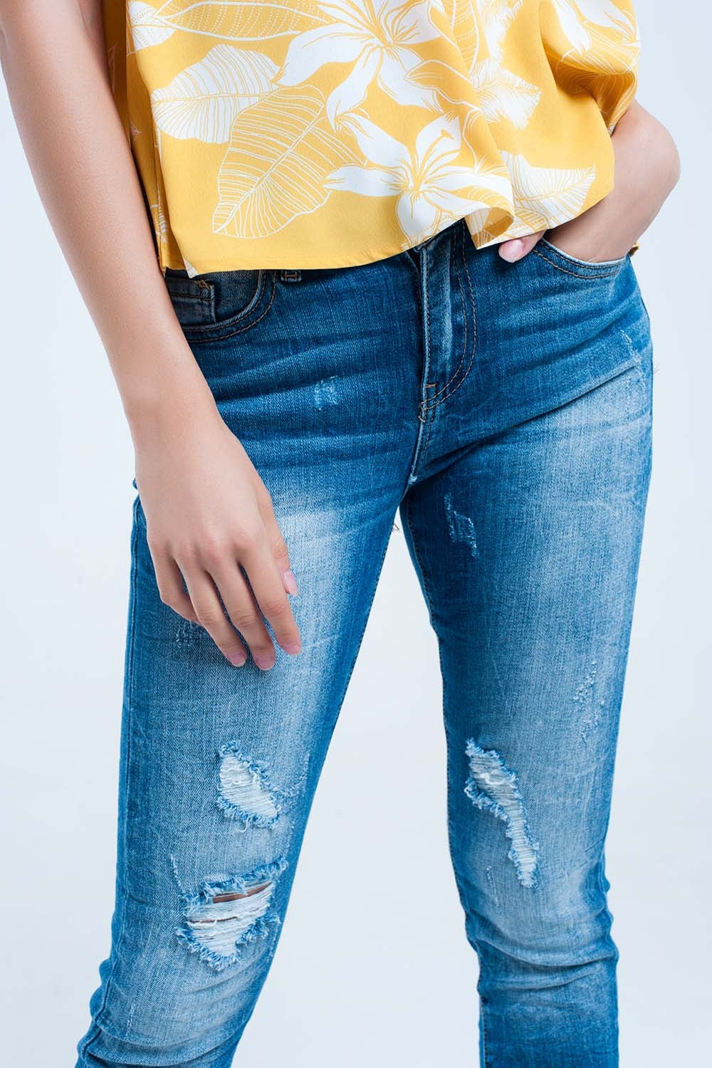 Mid wash fitted jeans with rips Q2 Jeans BoutiqueLua