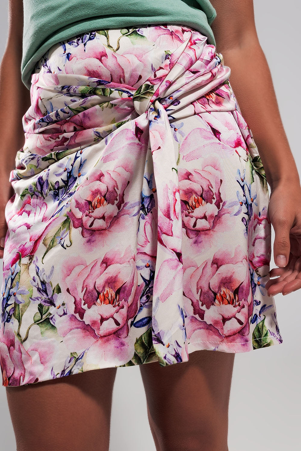 Mini skirt with knot front in pink rose print Q2 Skirts BoutiqueLua