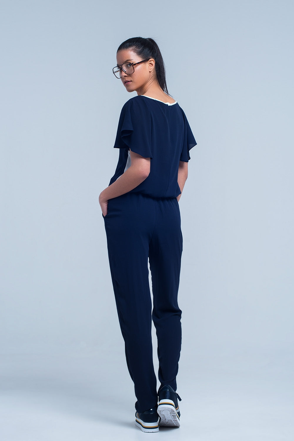 Navy blue jumpsuit with short sleeve and ruffle detail Q2 Dresses BoutiqueLua