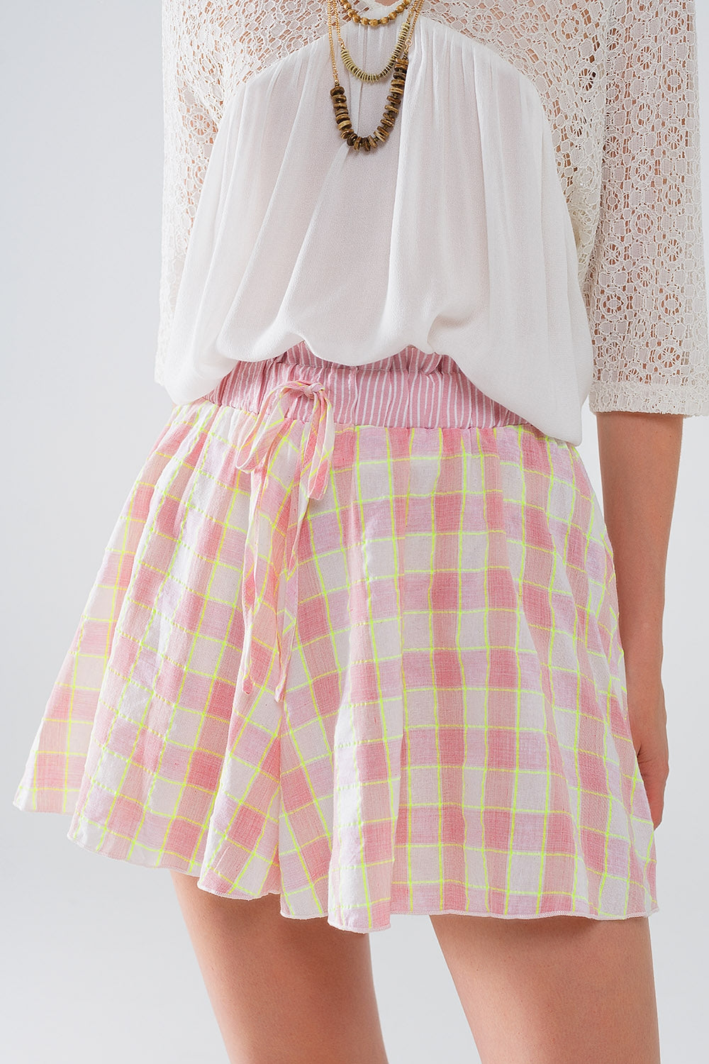 Pink Checkered print shorts with tight-fitting waist detail Q2 Pants BoutiqueLua