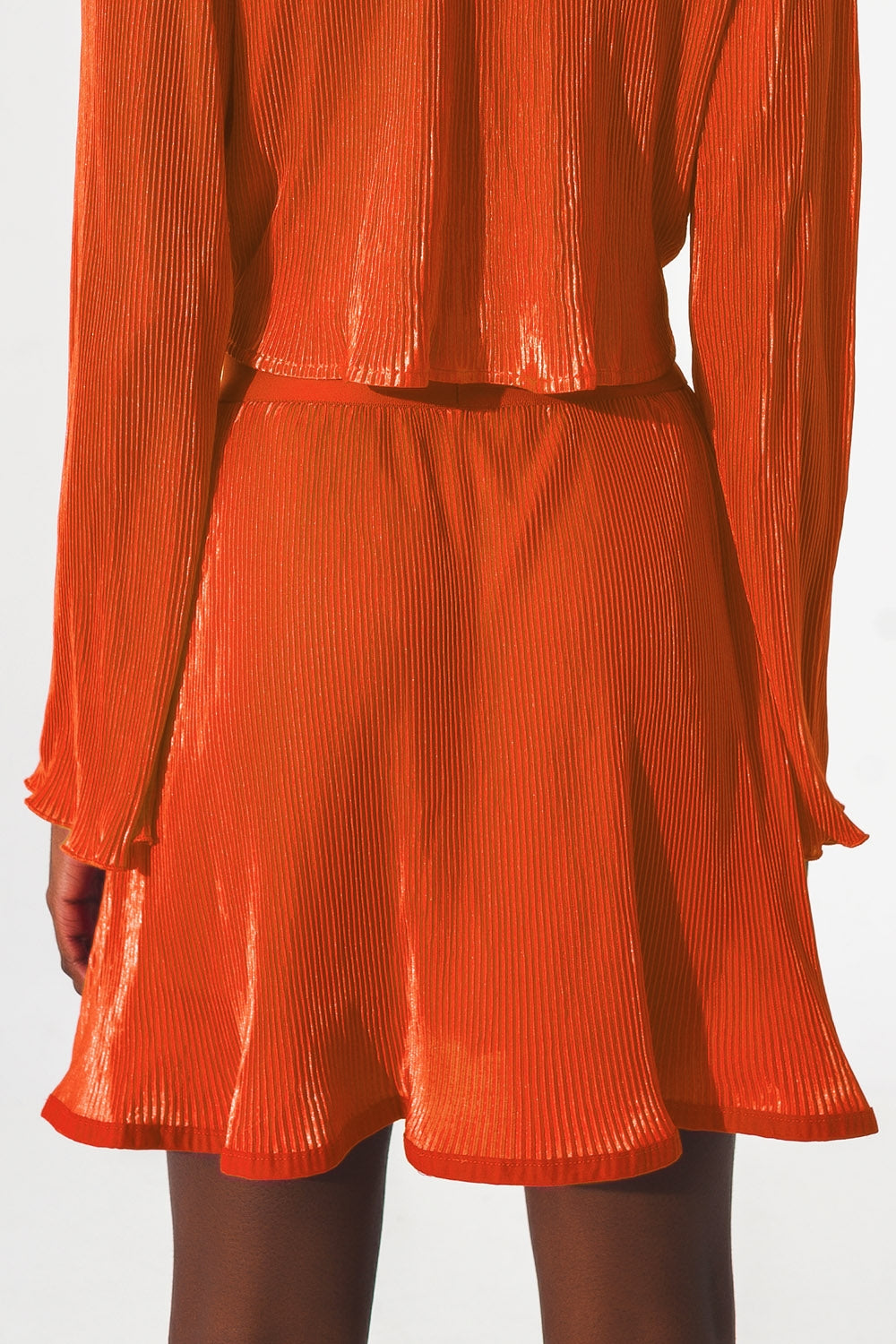 Pleated short skirt in orange Q2 Skirts BoutiqueLua