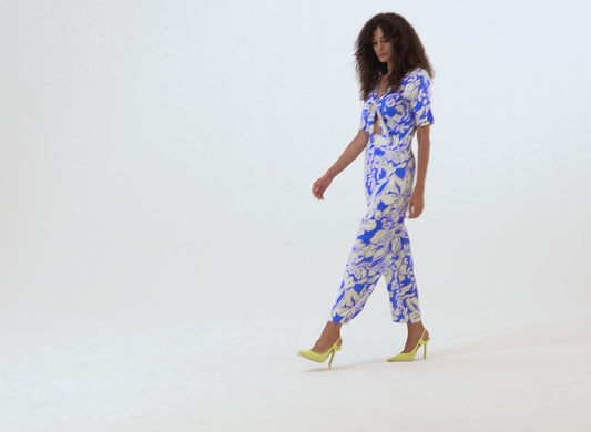 Short Sleeve Key Hole Front Floral Jumpsuit In Blue