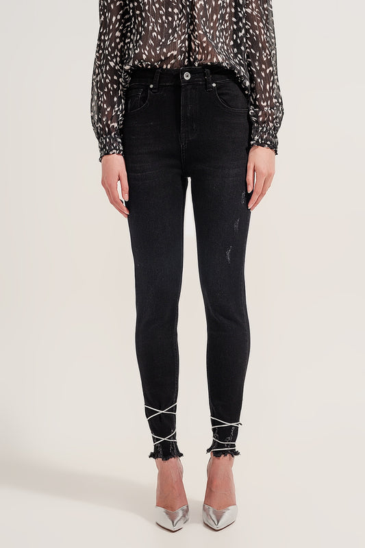 Q2 Raw hem skinny jeans in washed black