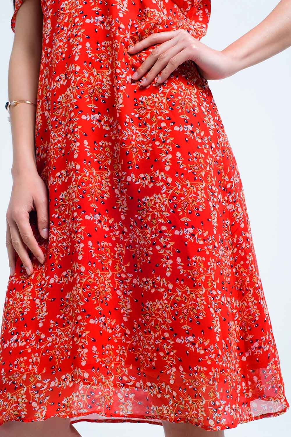 Red dress with printed flowers and ruffles Q2 Dresses BoutiqueLua