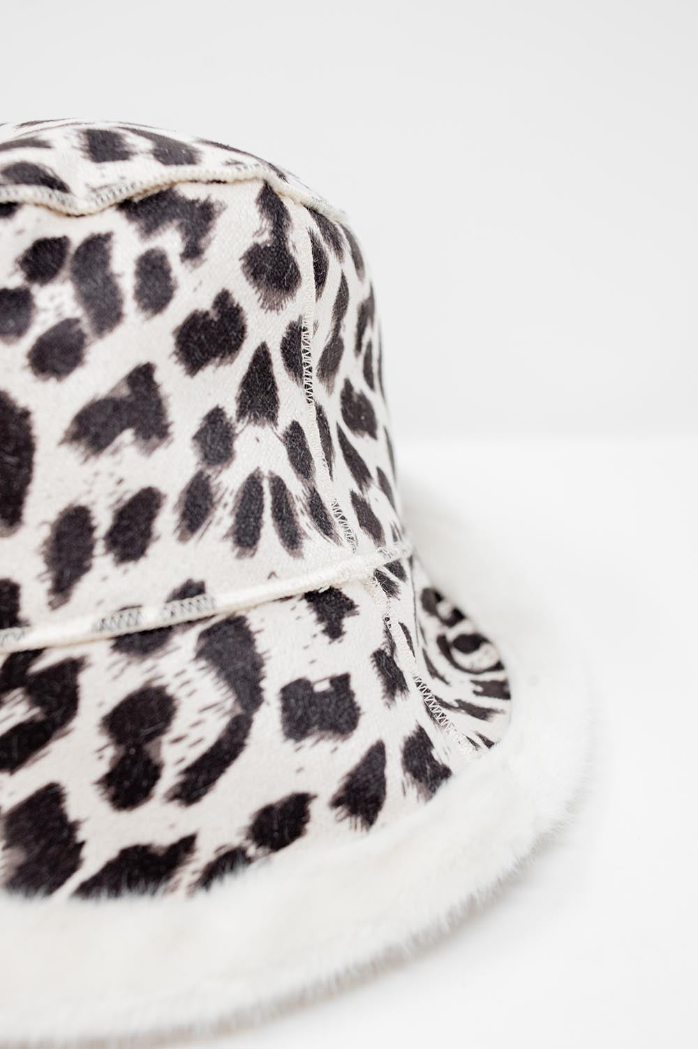 Reversible bucket hat in leopard print in ecru Q2 Hats BoutiqueLua