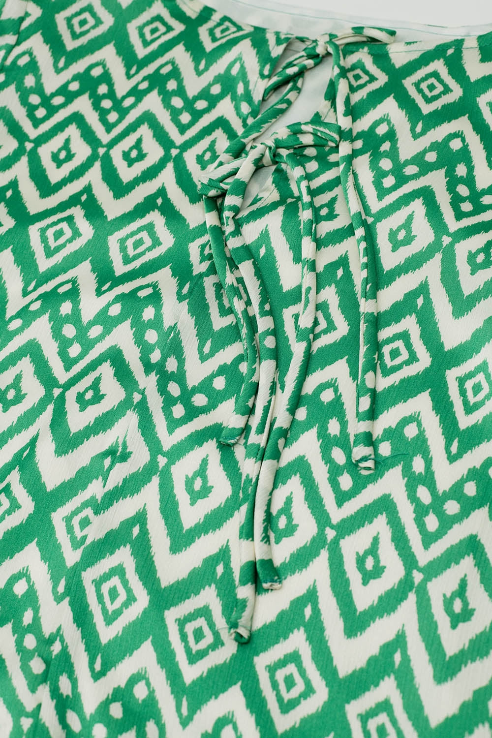 Short Dress With Tie At The Front Details in Ethnic Green Print Q2 Dresses BoutiqueLua