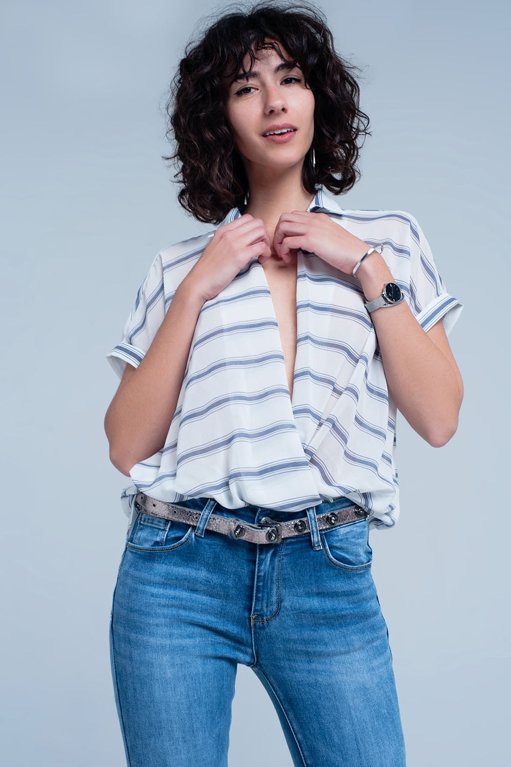 Q2 White short sleeve drape wrap blouse with blue striped design