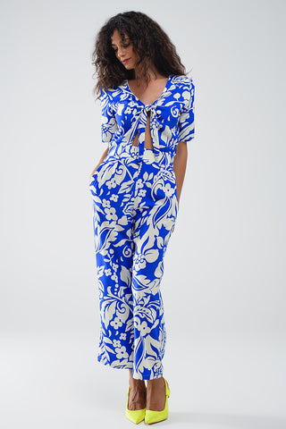 Short Sleeve Key Hole Front Floral Jumpsuit In Blue