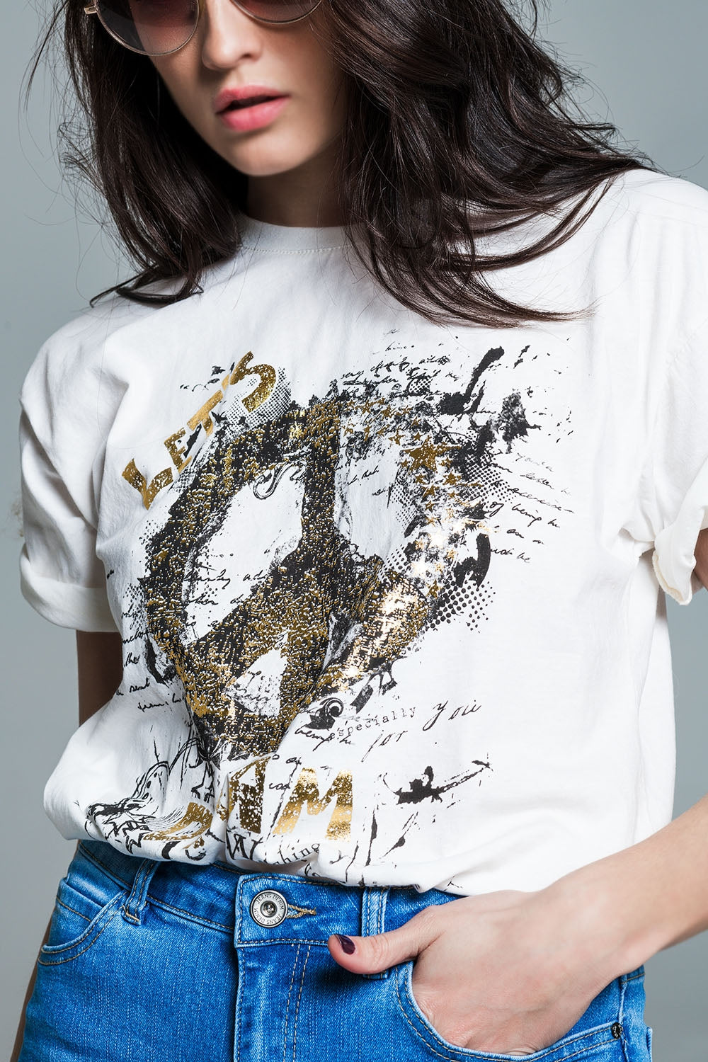 Short Sleeve T-shirt With Graphic Peace Sign Design At The Front In Cream Q2 Tops BoutiqueLua