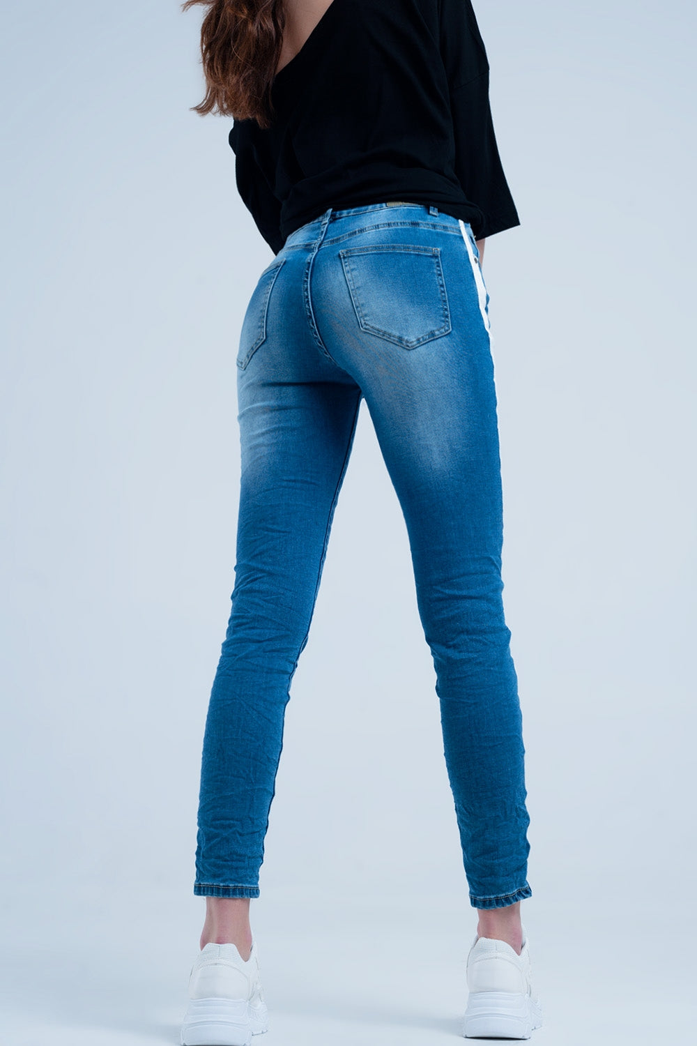 Skinny jeans with white side stripe BoutiqueLua