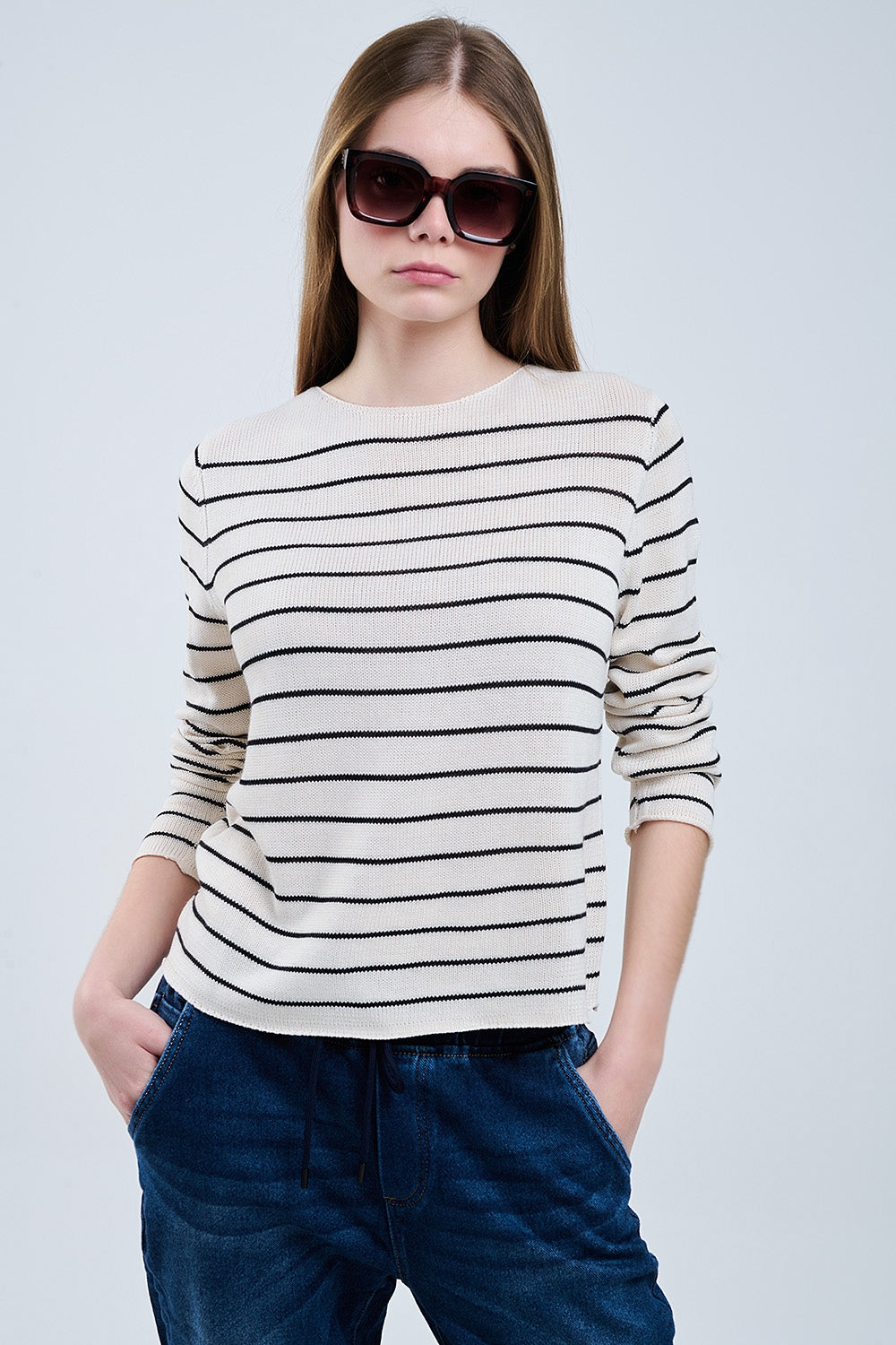 striped beige sweater made of fine knitting