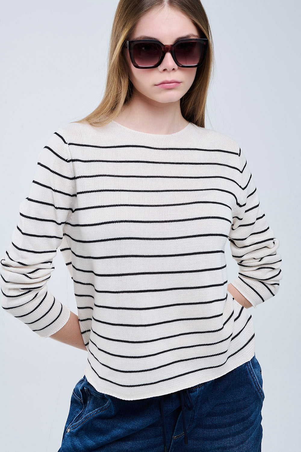 striped beige sweater made of fine knitting