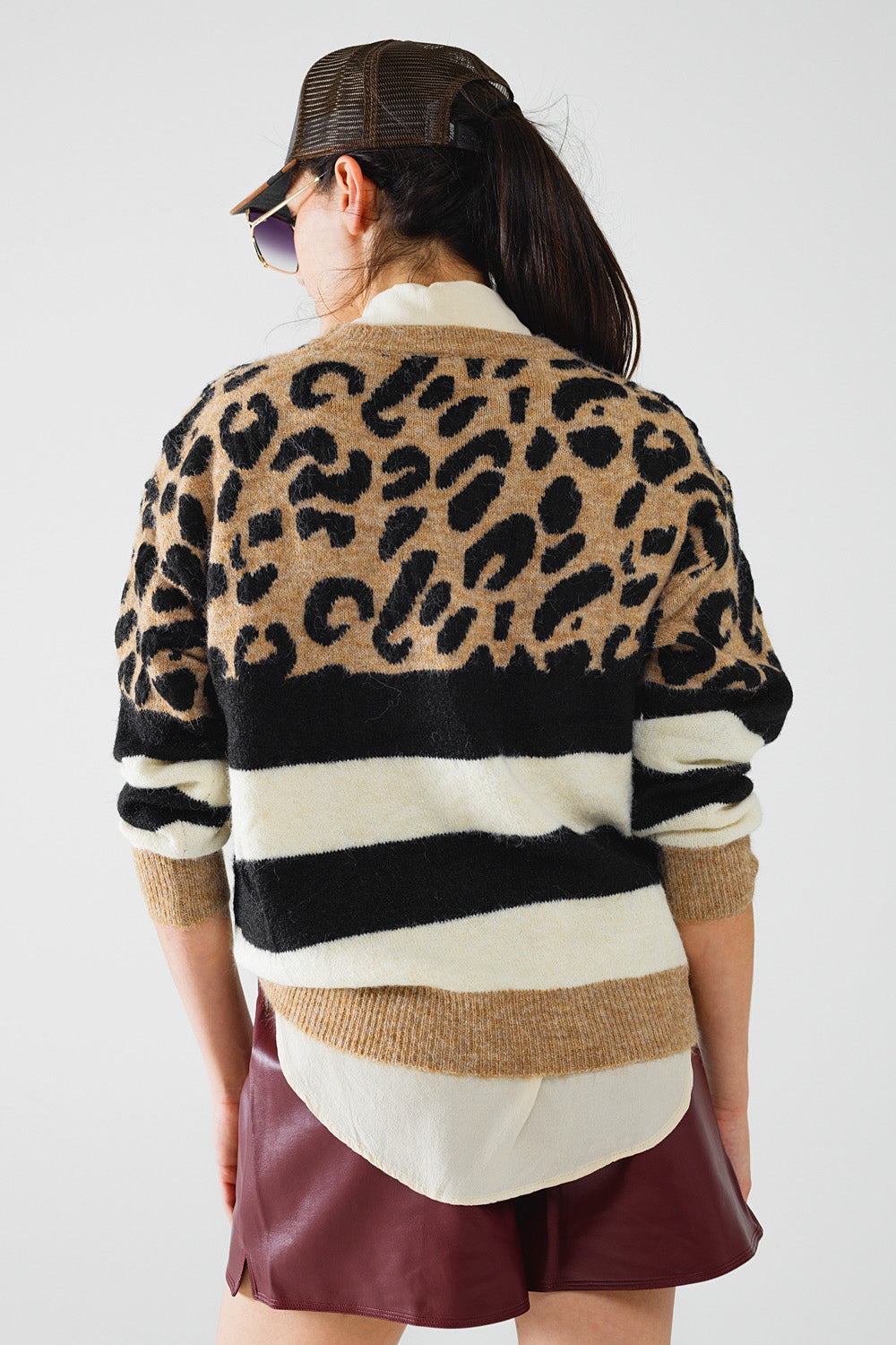 stylish knitted panther print sweater with black and white stripes