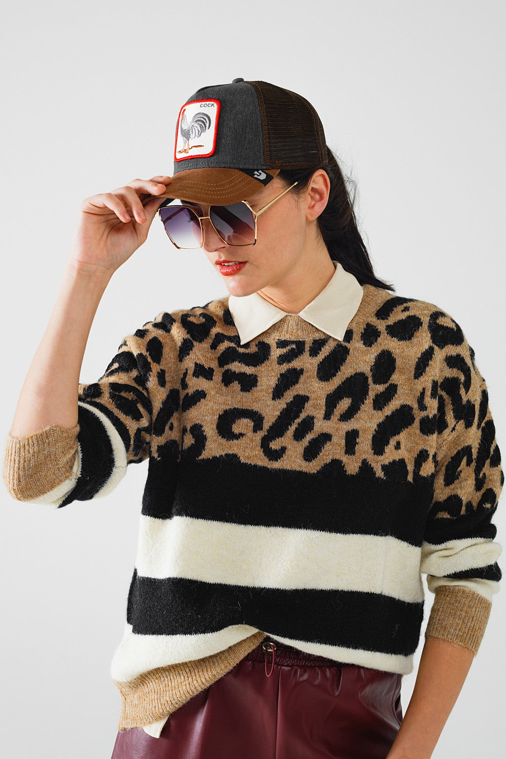 stylish knitted panther print sweater with black and white stripes