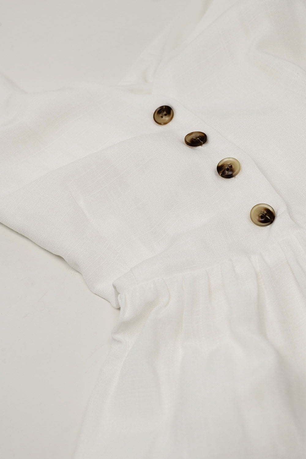 White dress with button detail Q2 Dresses BoutiqueLua