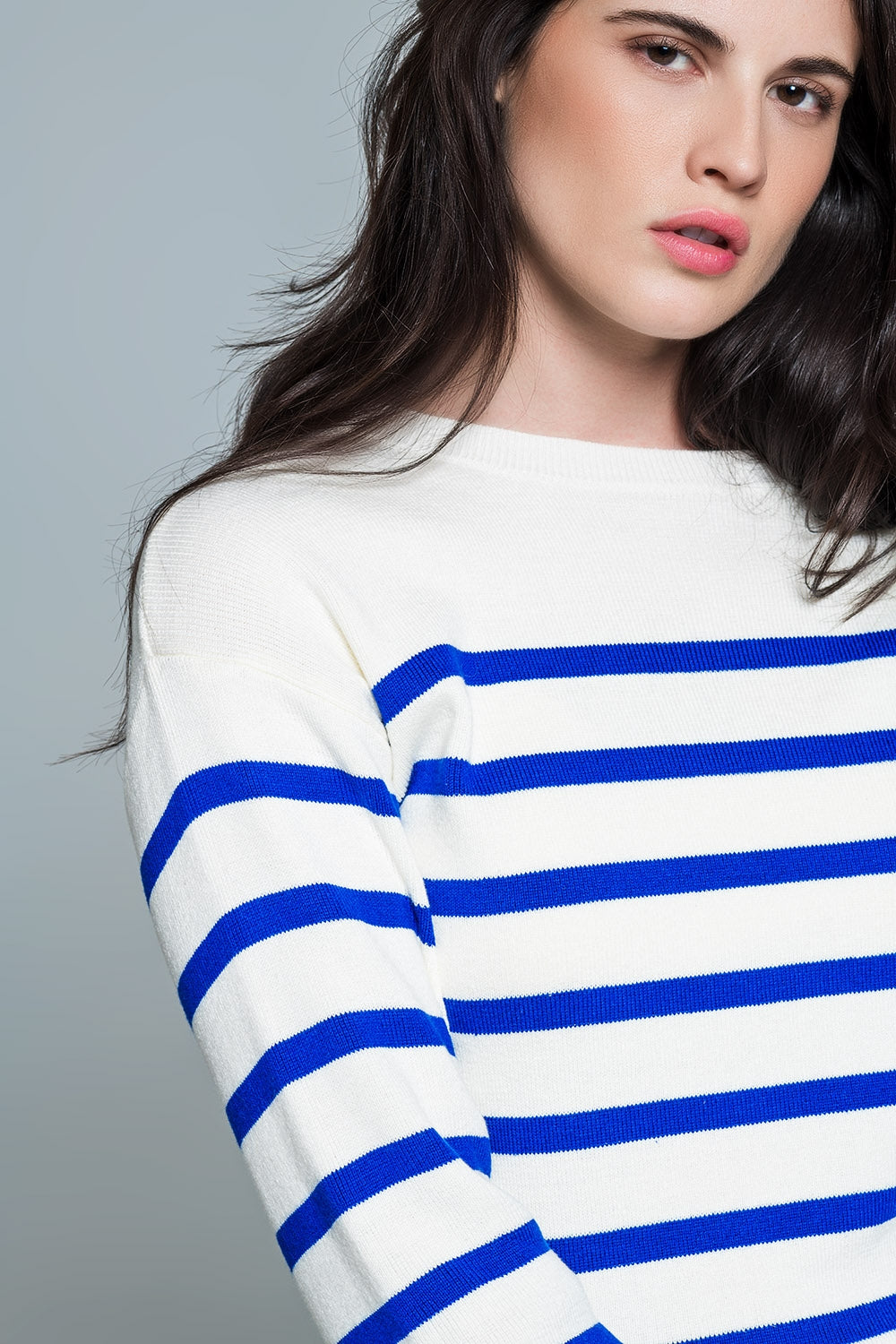 White sweater with buttons on shoulders and blue stripes Q2 Sweaters BoutiqueLua