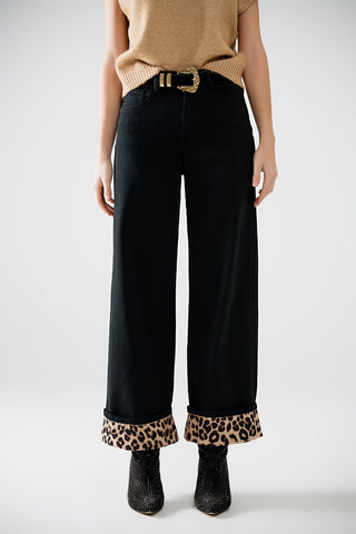 Wide leg black pants with leopard print at the bottom