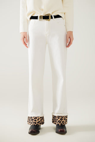 Wide leg cream pants with leopard print at the bottom